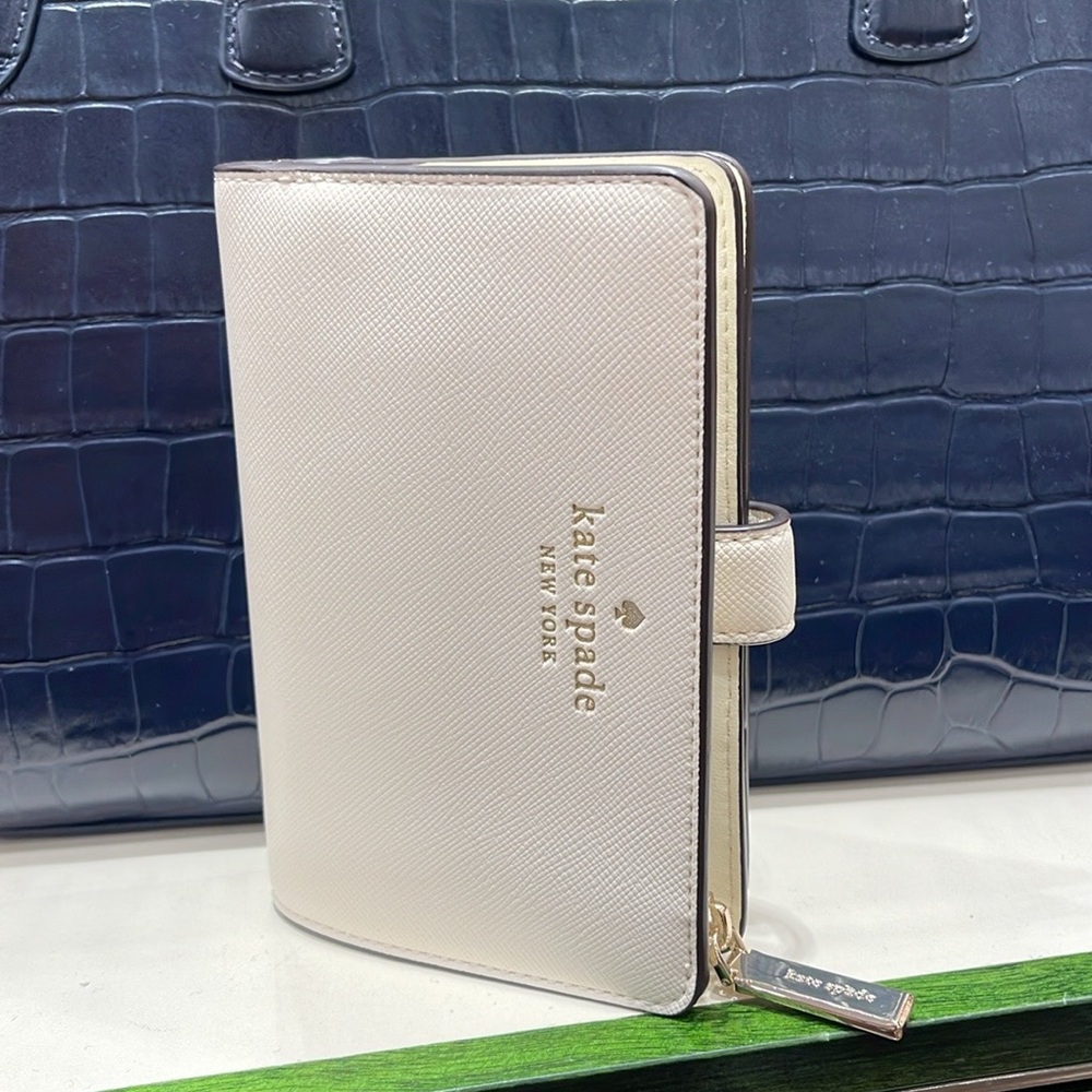 Kate Spade Schuyler Medium Compact Bifold Wallet
Meringue 
NWT - Picture 13 of 16